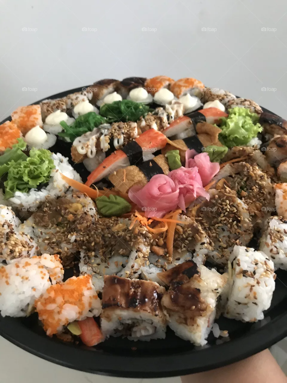 A plate of colorful sushi
