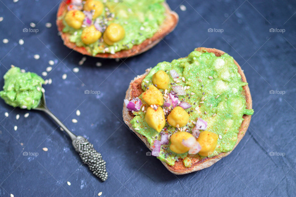 guacamole garbanzo beans sandwich is our favourite on a wheat bread  as a healthy breakfast.