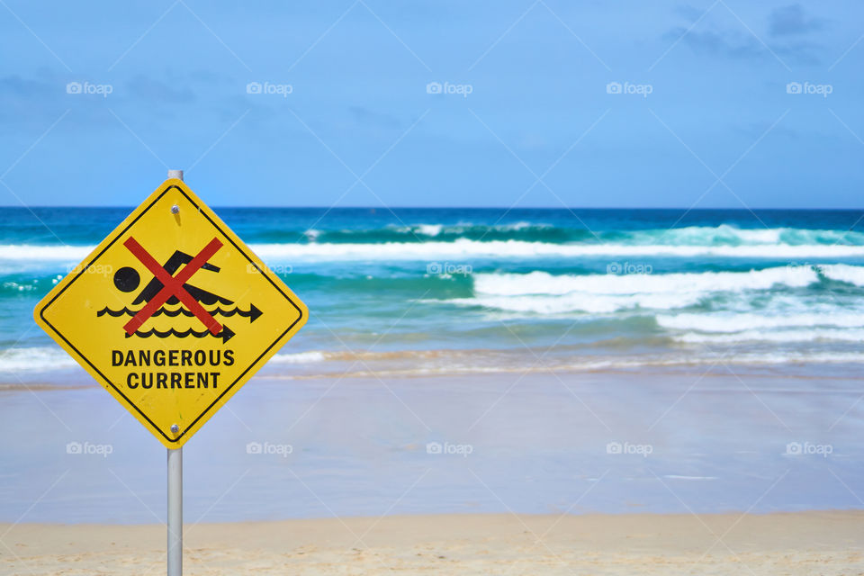 Dangerous waves warning sign