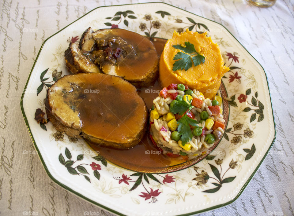 delicious beef meal with sweet baked potatoes puree and vegetables