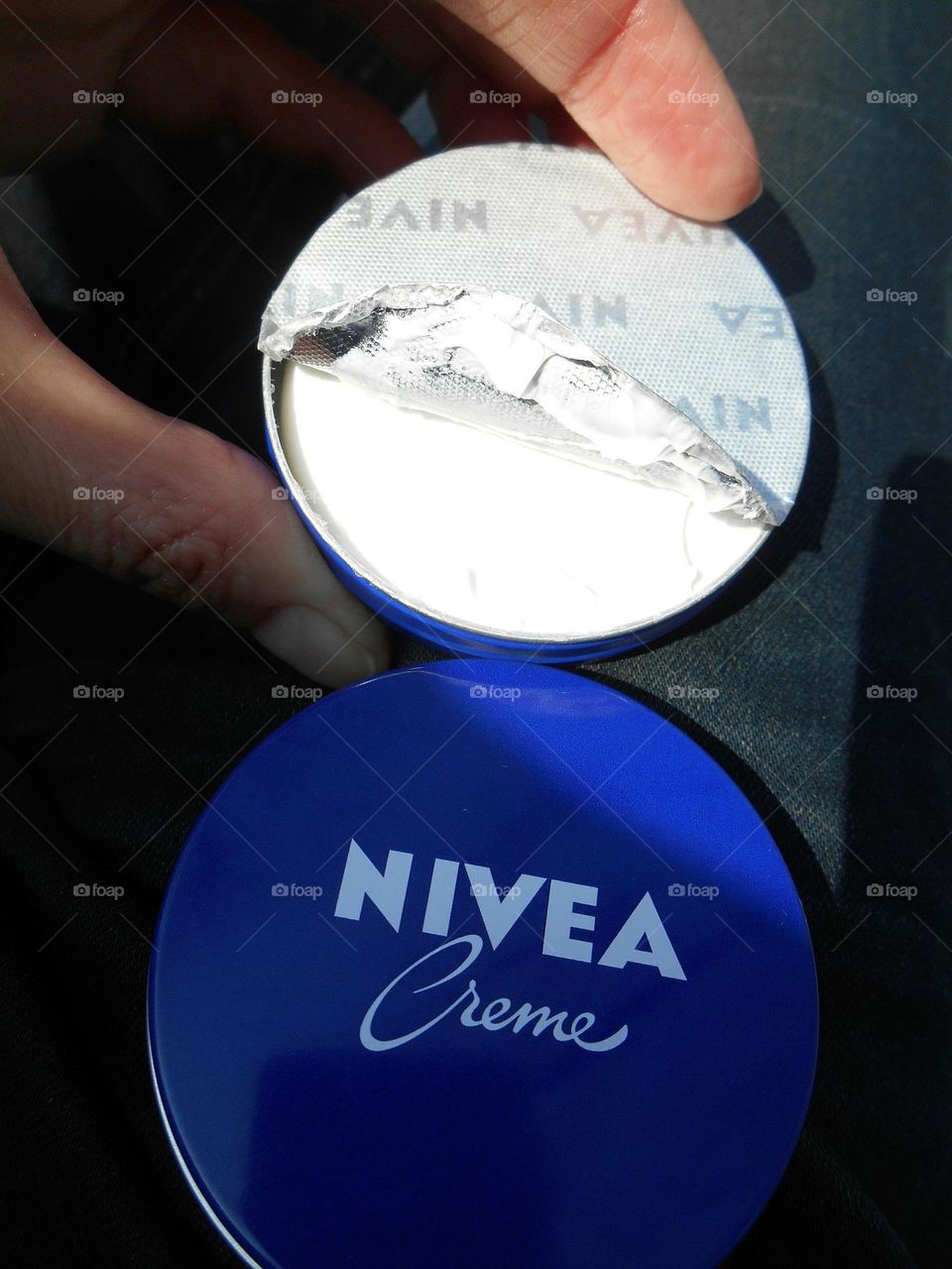 Nivea cream in the hand products love