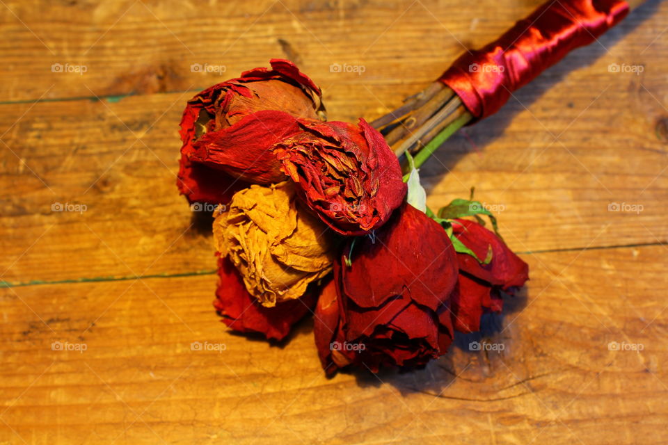 roses on wooden table