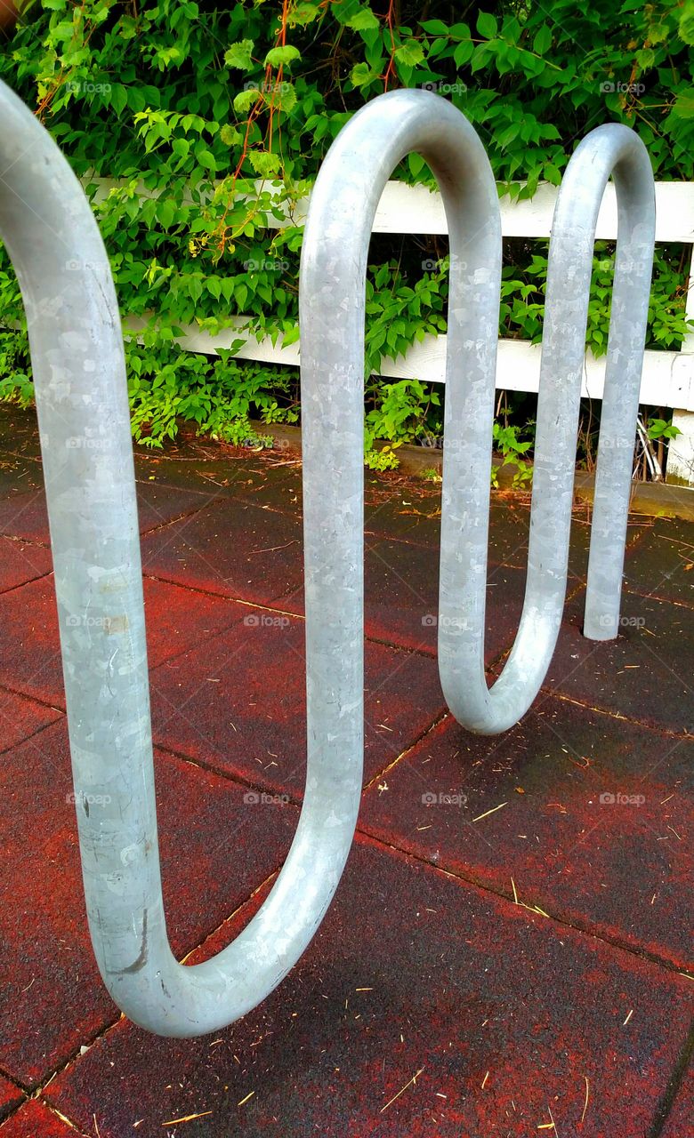 bike rack Park trees fence padding