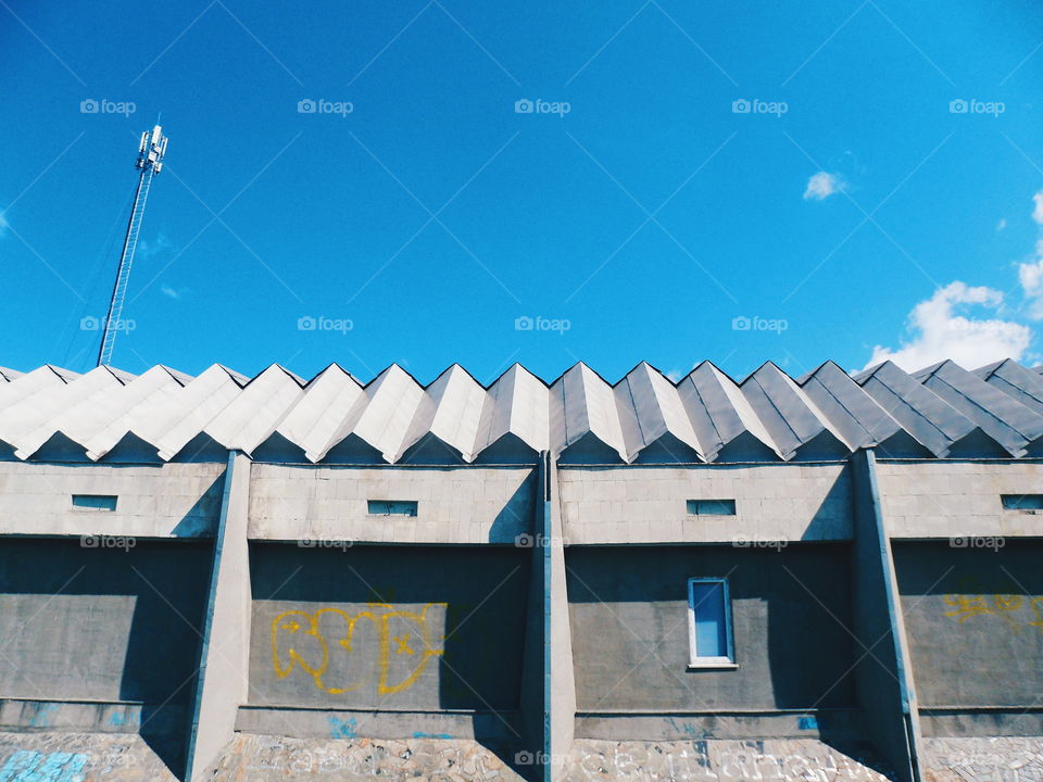 roof of a building against a blue sky