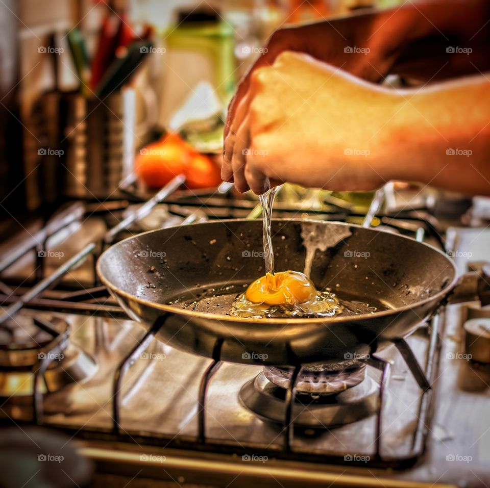 making breakfast with eggs and toast