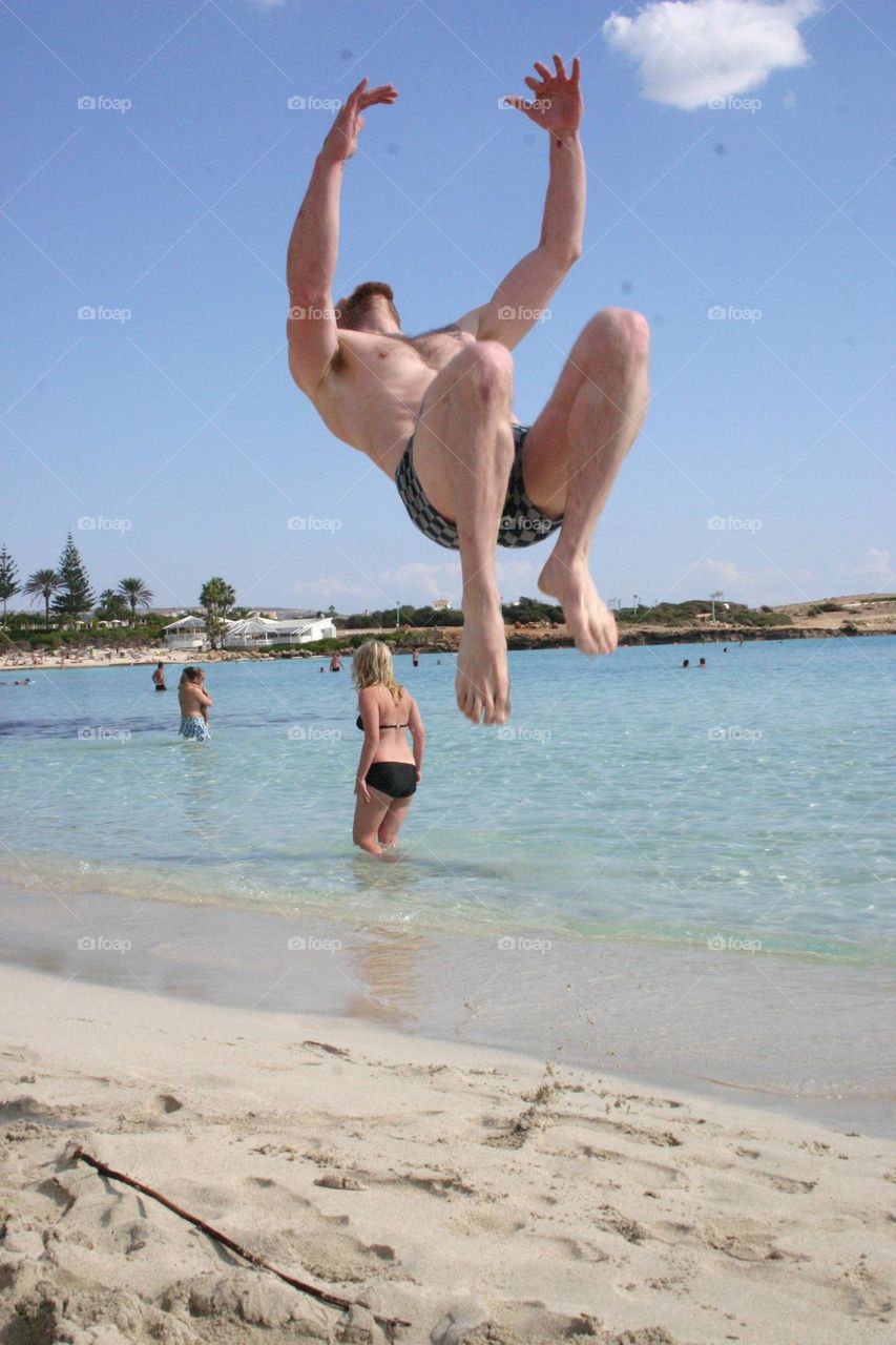 somersault on the beach