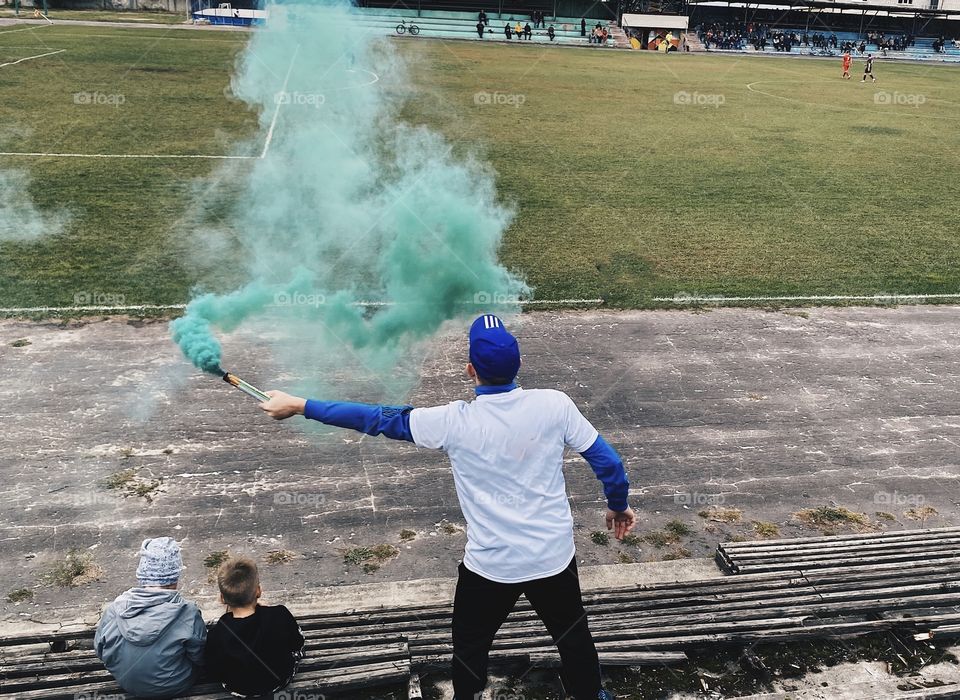 Football fan from behind