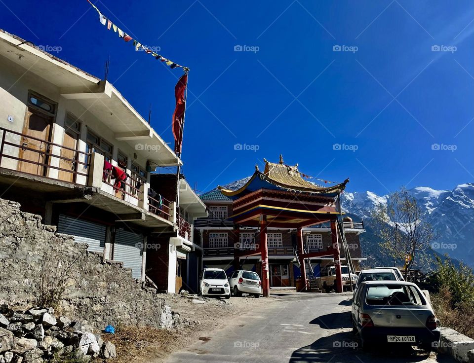 Entrance to countryside village with purifying Buddhist gate 