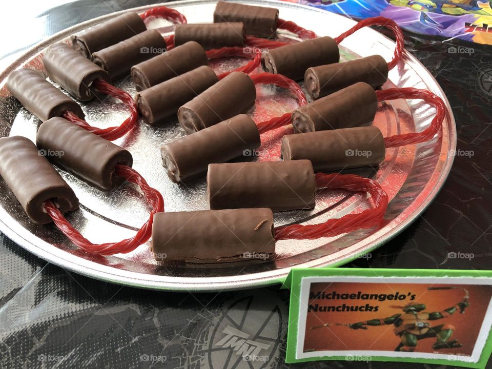 TMNT themed birthday party with HoHo Treats as nunchucks 