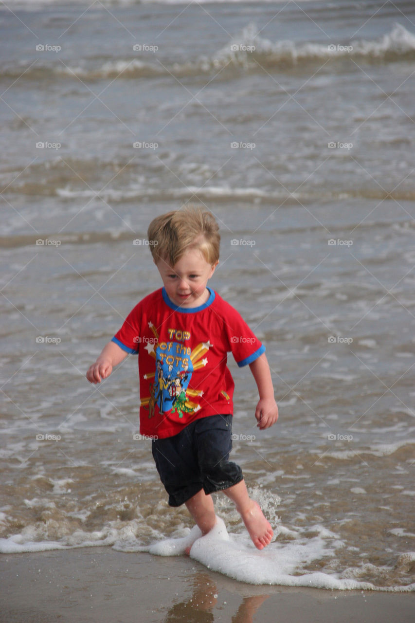 beach red play child by kshapley