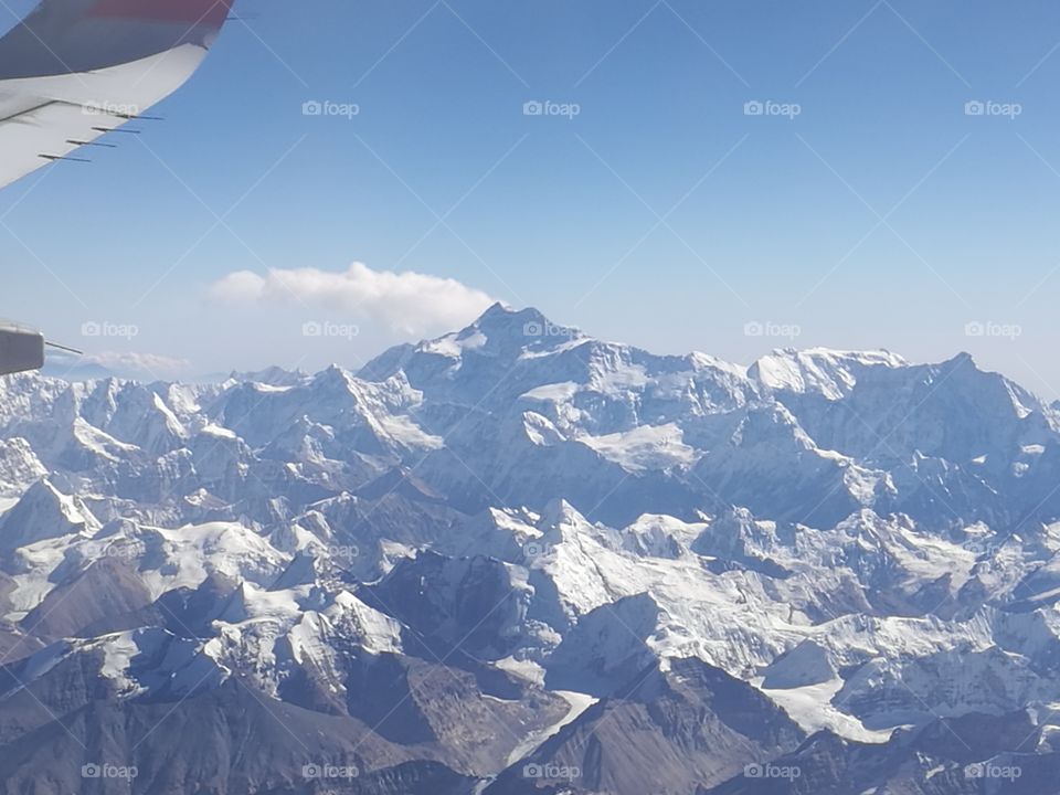 Himalayan range displaying the the tallest mountain in the world Mt. Everest. This was taken while flying from Kathmandu, Nepal to Lhasa, Tibet.