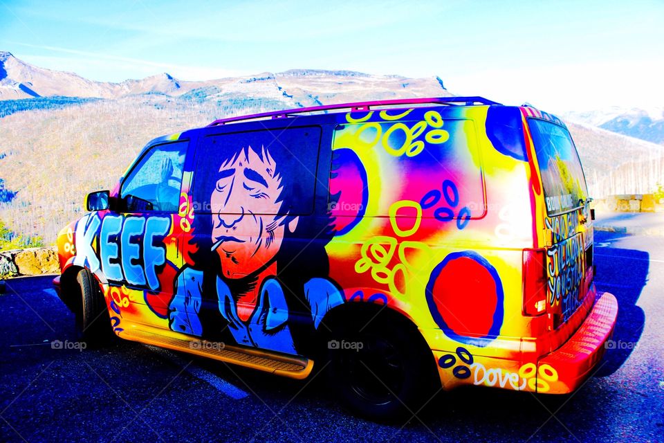 A sharp color painted car in the nature in glacier national park