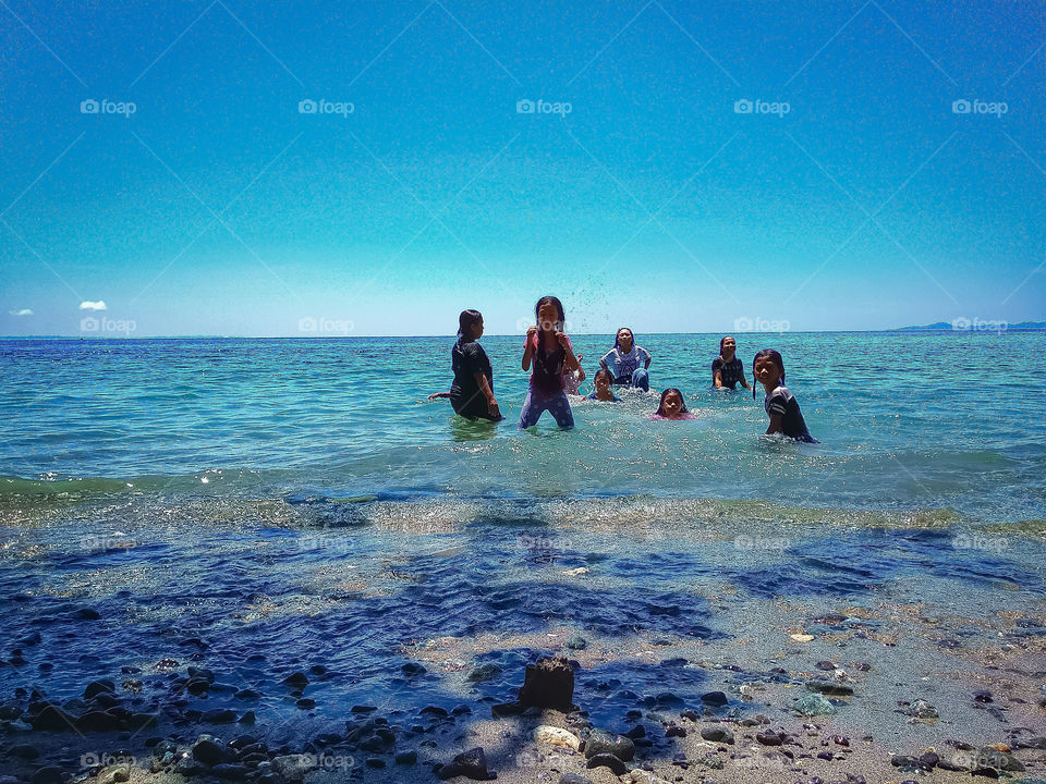 playing at the beach