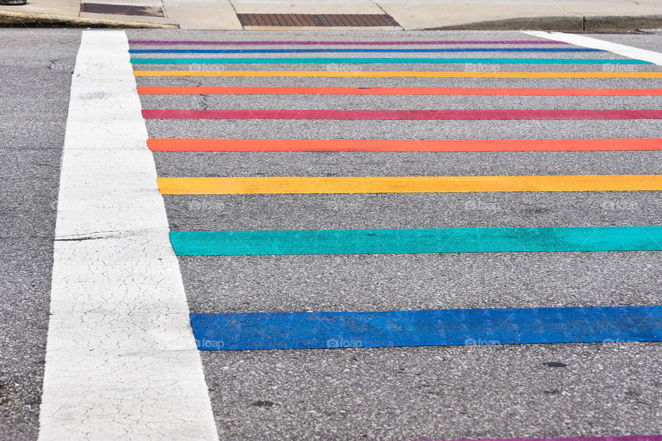 Rainbow colored crosswalk on a city street