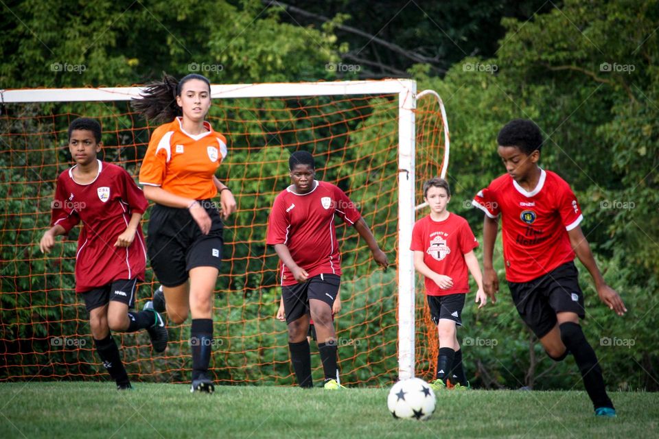 Playing soccer