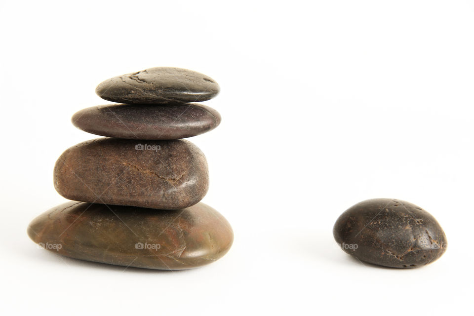 Stack of Pebbles on white background