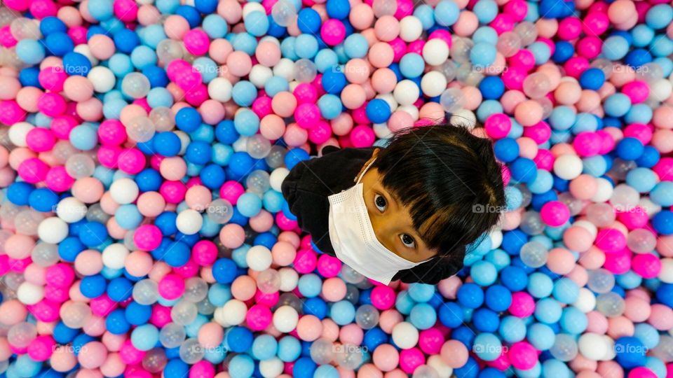 playing colorful balls on the playground