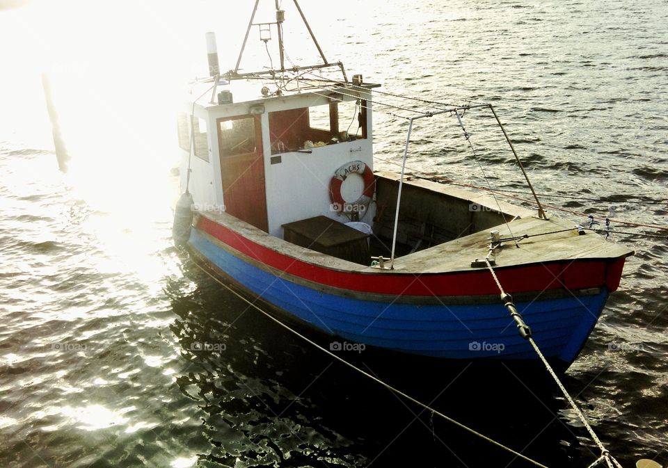boat at sunset. Kiel ostufer