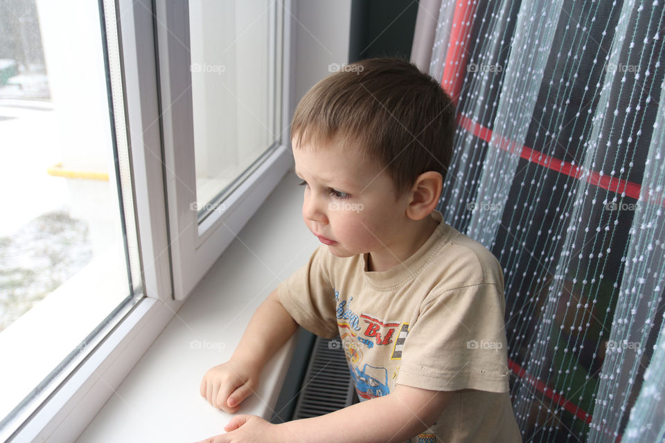 boy under the window