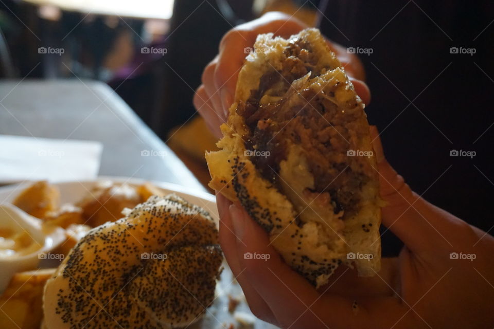 Burger in a bun that was soooo huge it had to be cut in half ... simply delicious ... topped with caramelised onion relish 😋