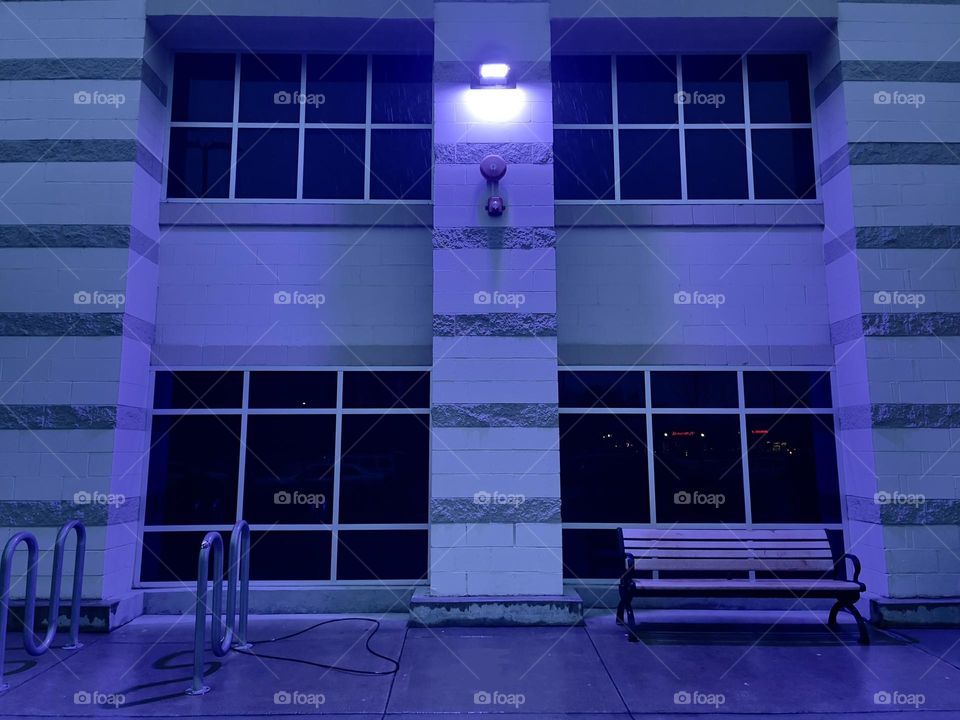 Purple light on the building facade 