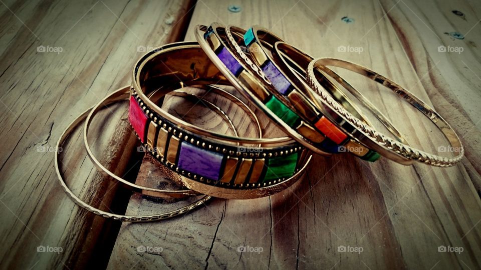 Bangles on wooden table