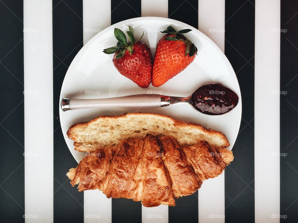 Elevated view of puff pastry with strawberry