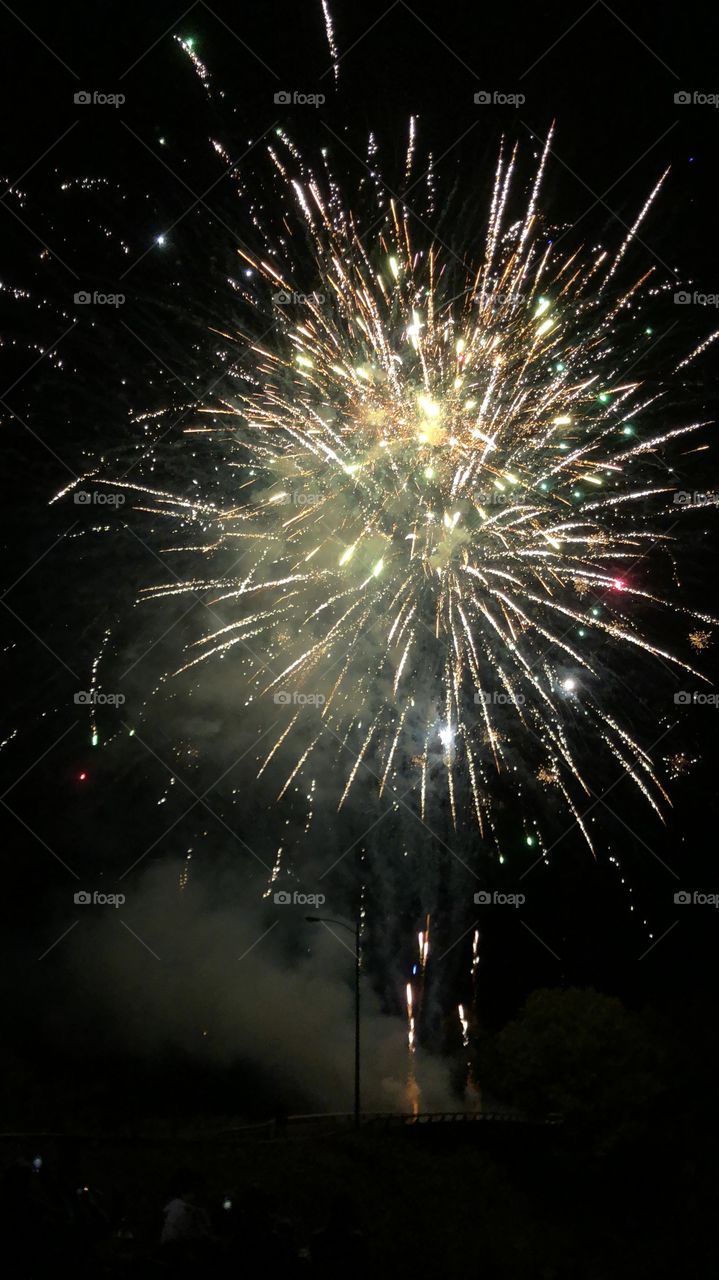 Flashes of fireworks on a nice clear evening