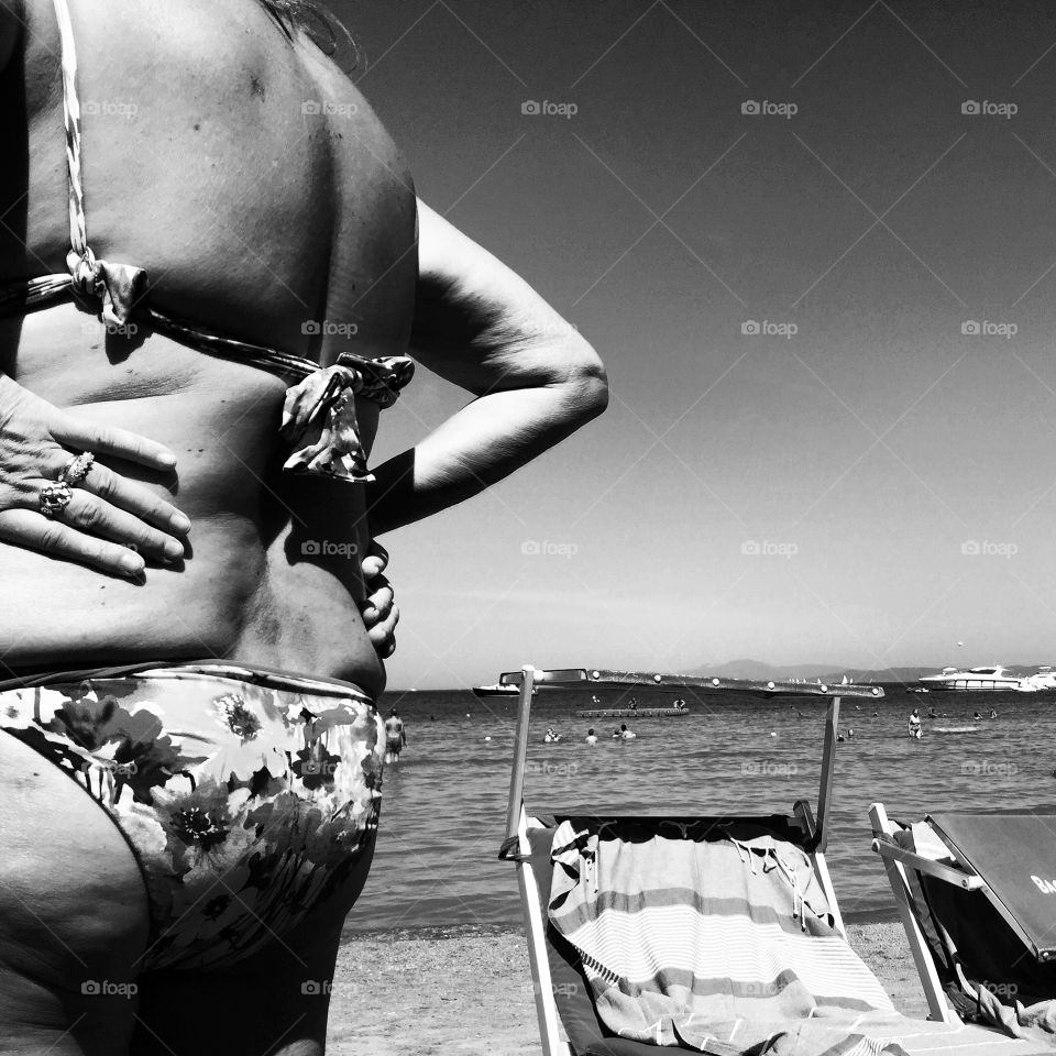 Woman standing on the beach 