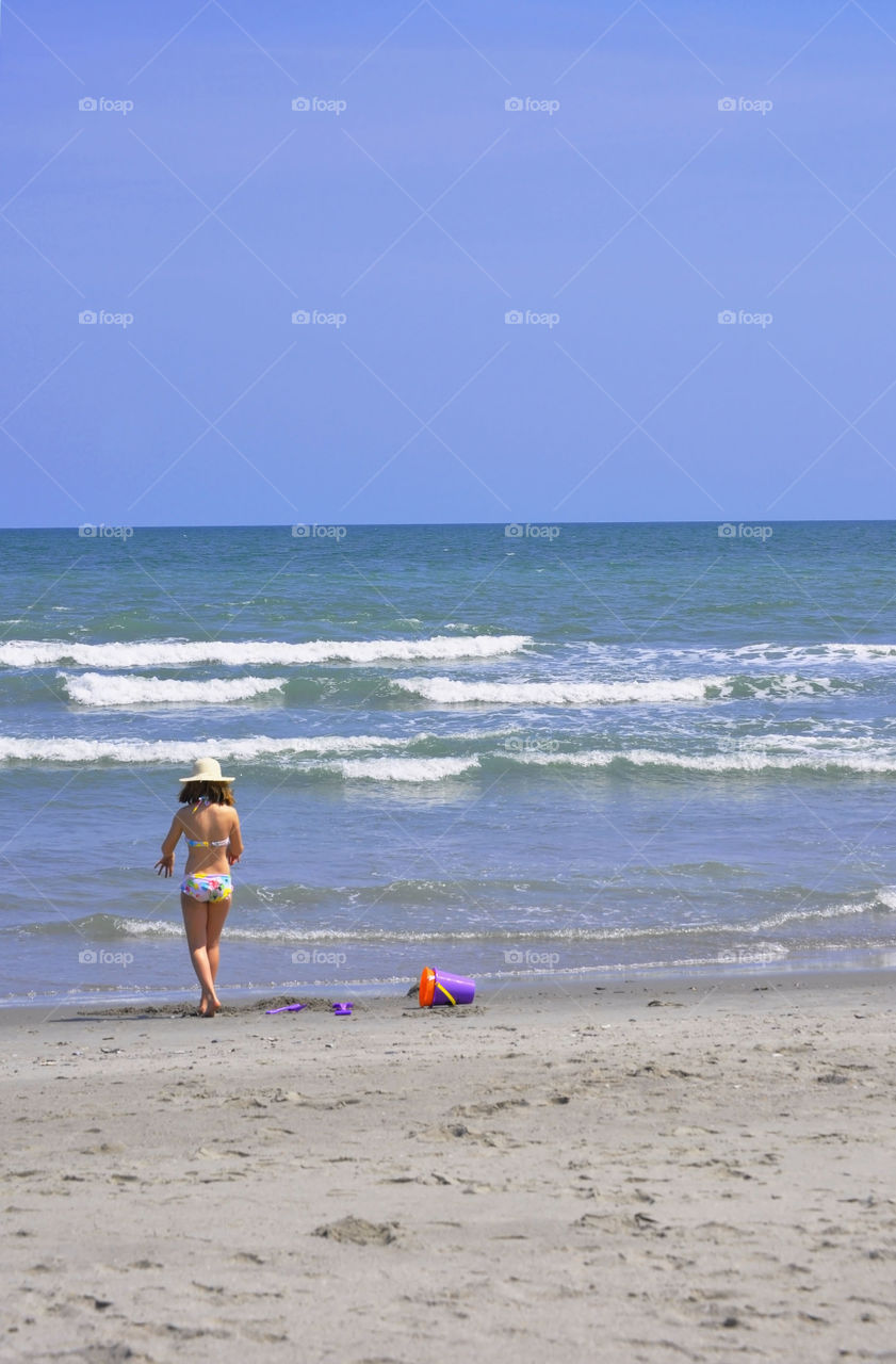 Beach. A young lady enjoy spring break in Myrtle Beach South Carolina