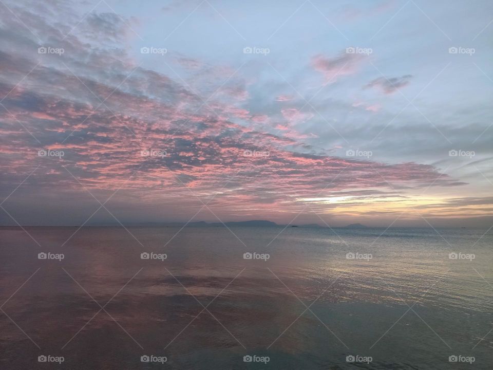 Baby pink clouds at a beach resort in Kep Cambodia