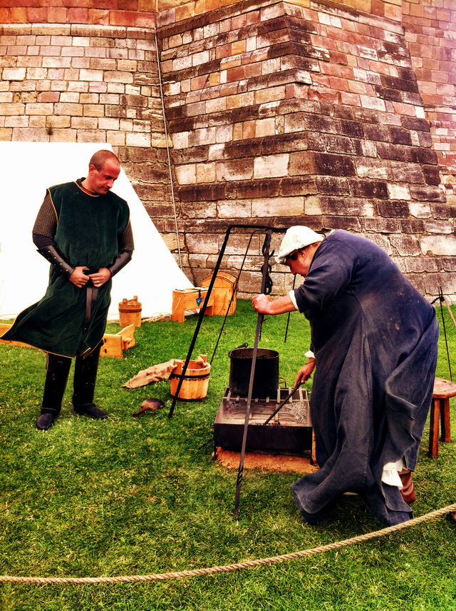 Medieval chef cooking dinner