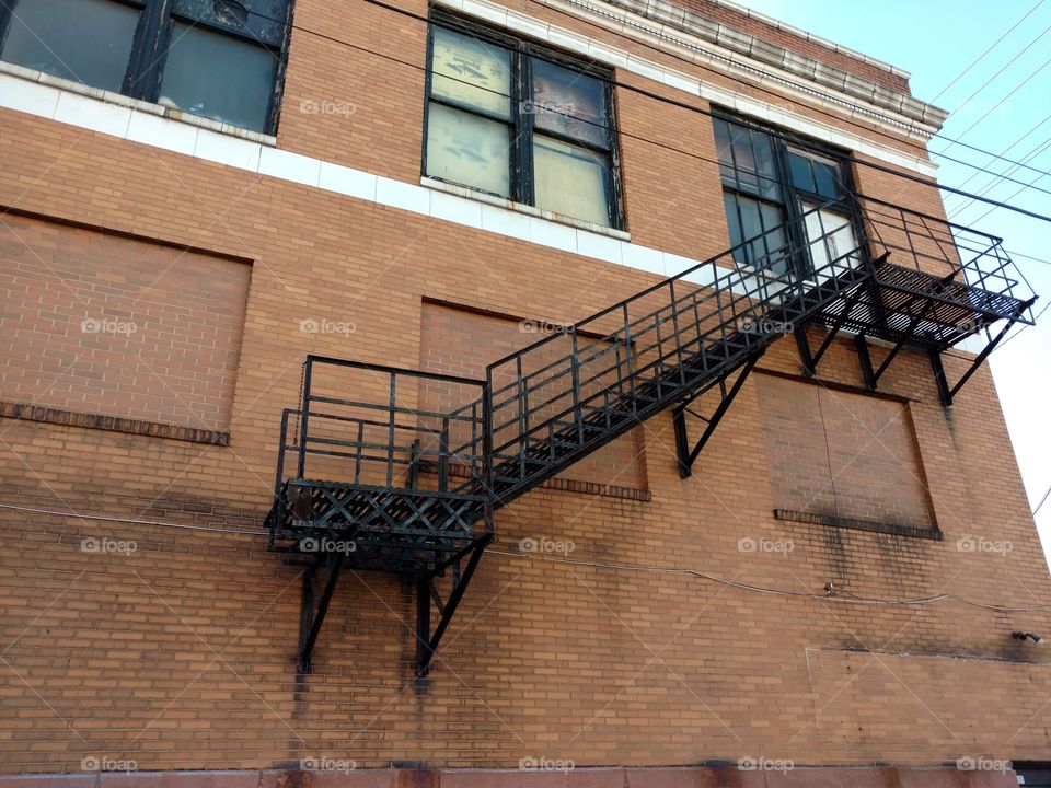 Rustic charm in an old building rot iron fire escape