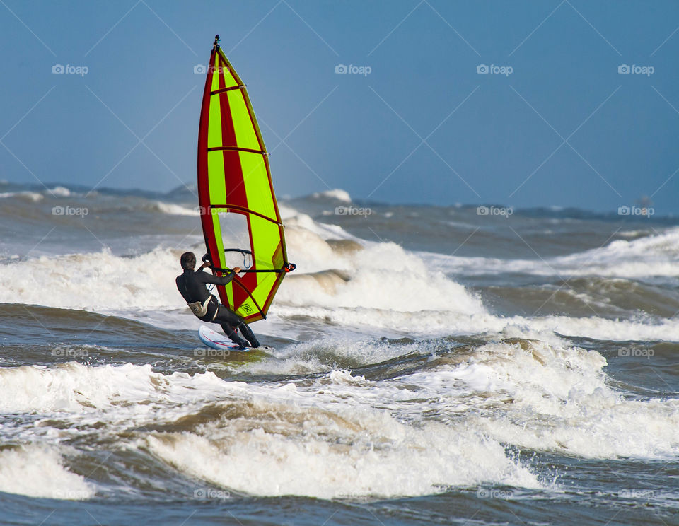 Surfing through high waves