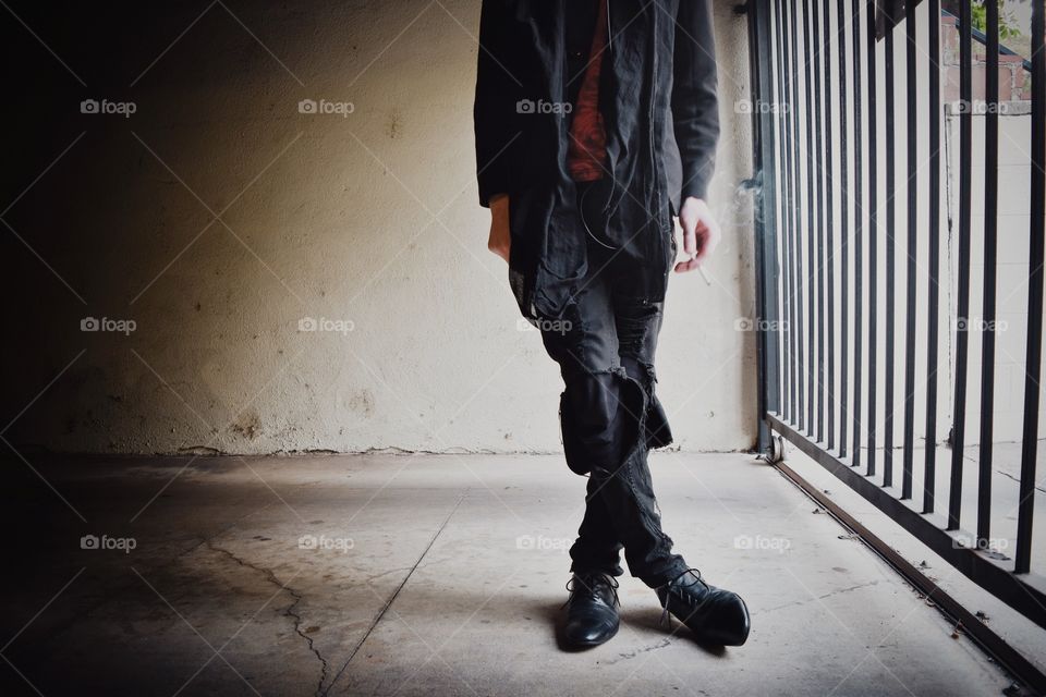 Low section of person in house