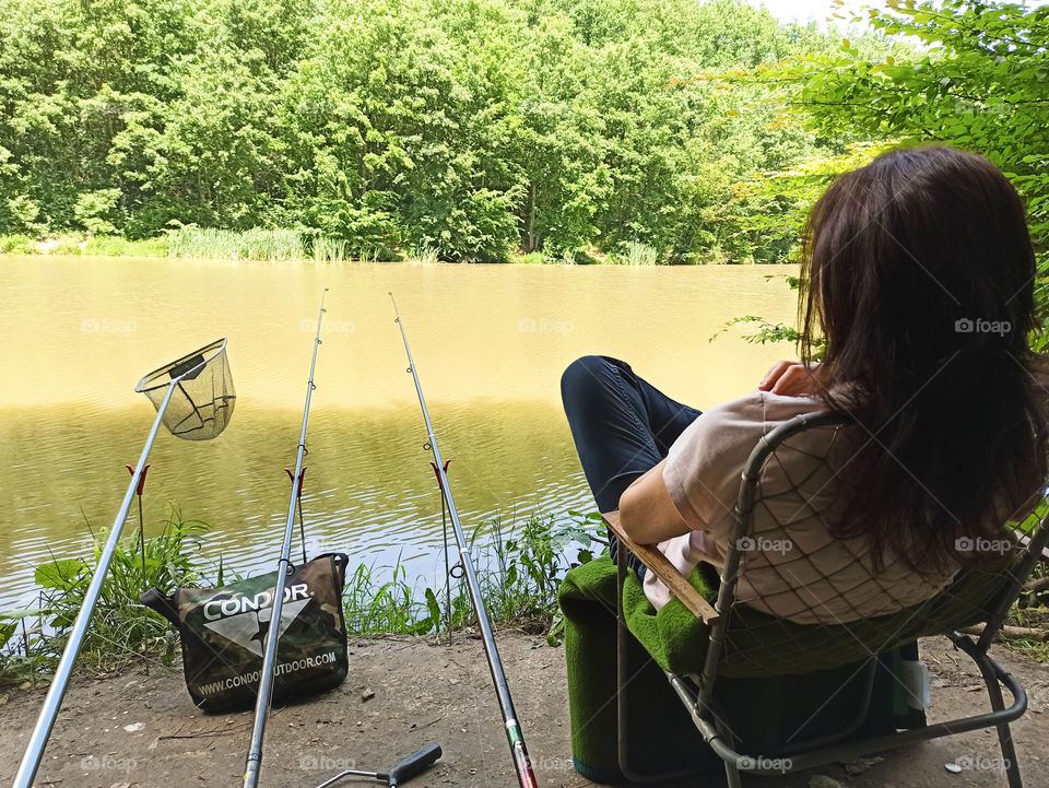 camping fishing resting at the lake
