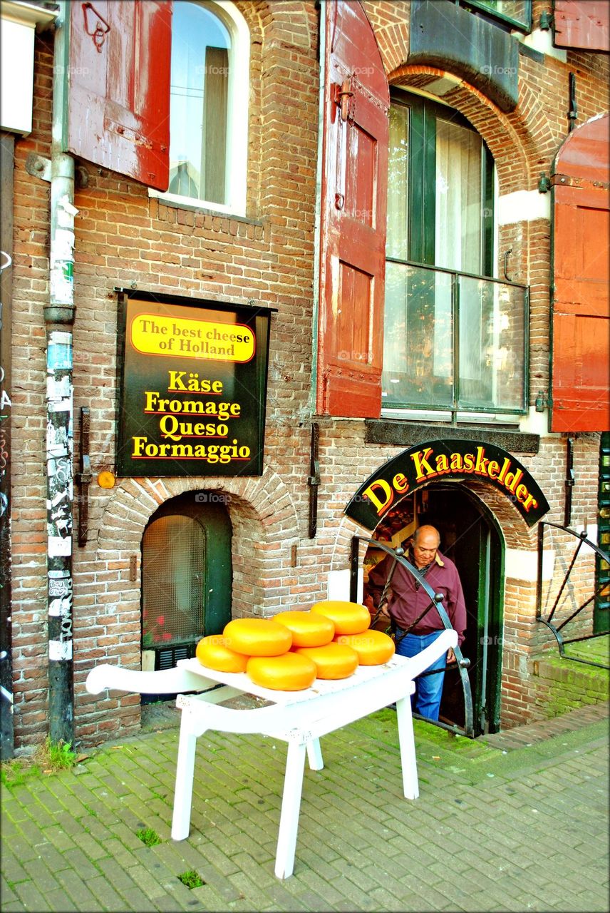 Man in Holland shop ready to buy cheese products amazing trip summer holidays Amsterdam sin city tourism summer feeling traveling with friends