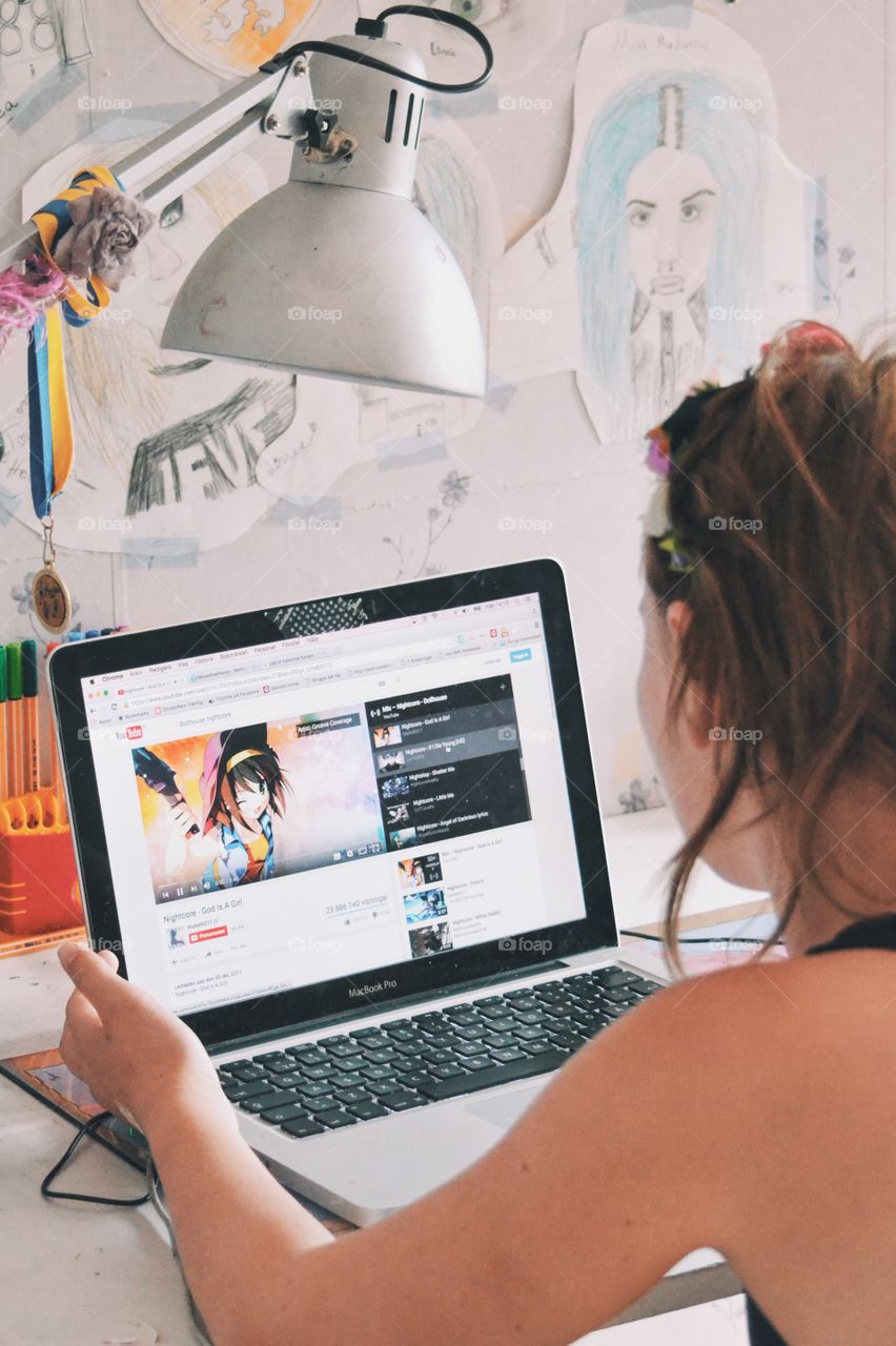 Girl using her computer