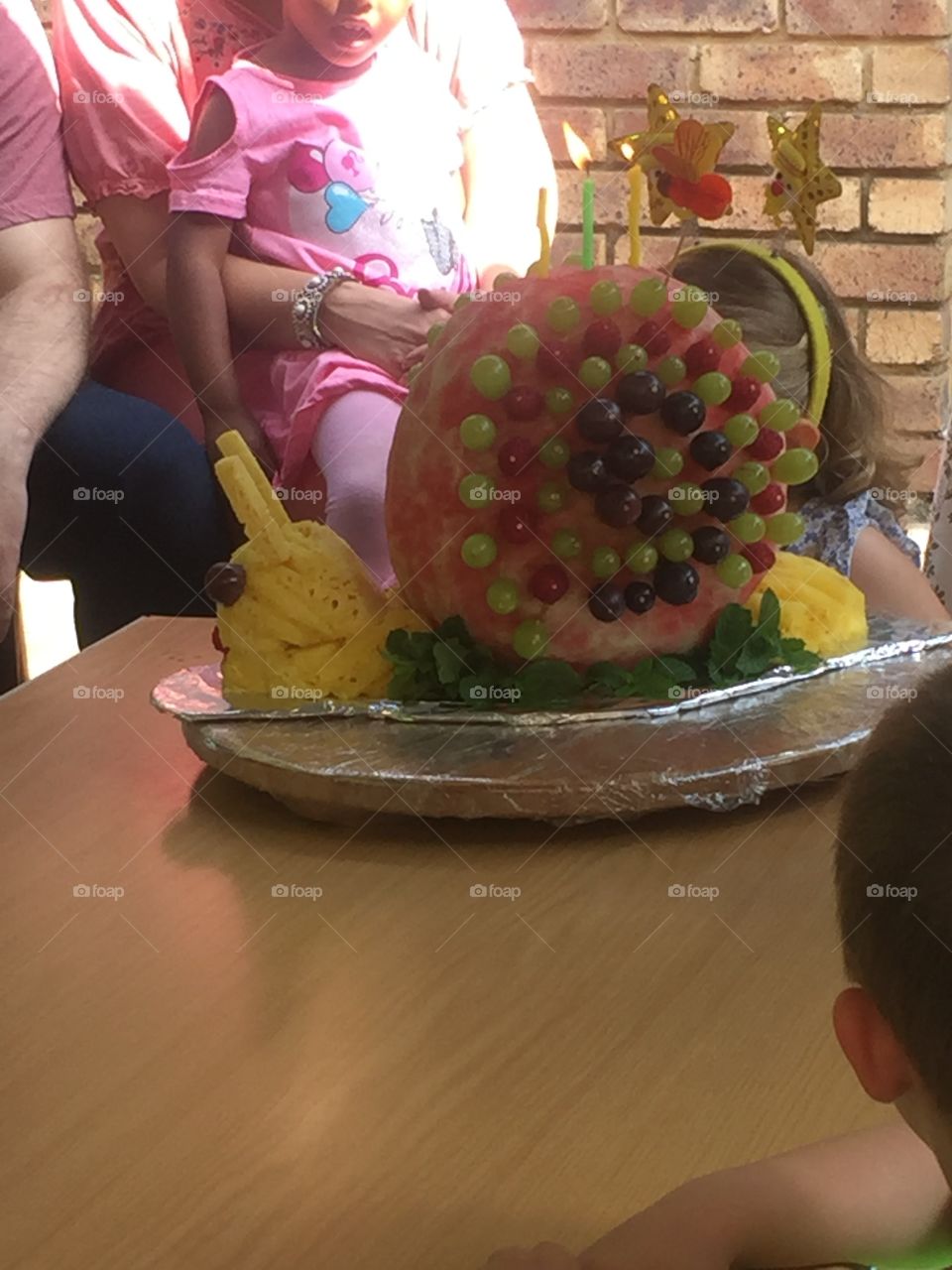 Snail fruit. What better birthday cake than a watermelon, pineapple, grape and berry snail!