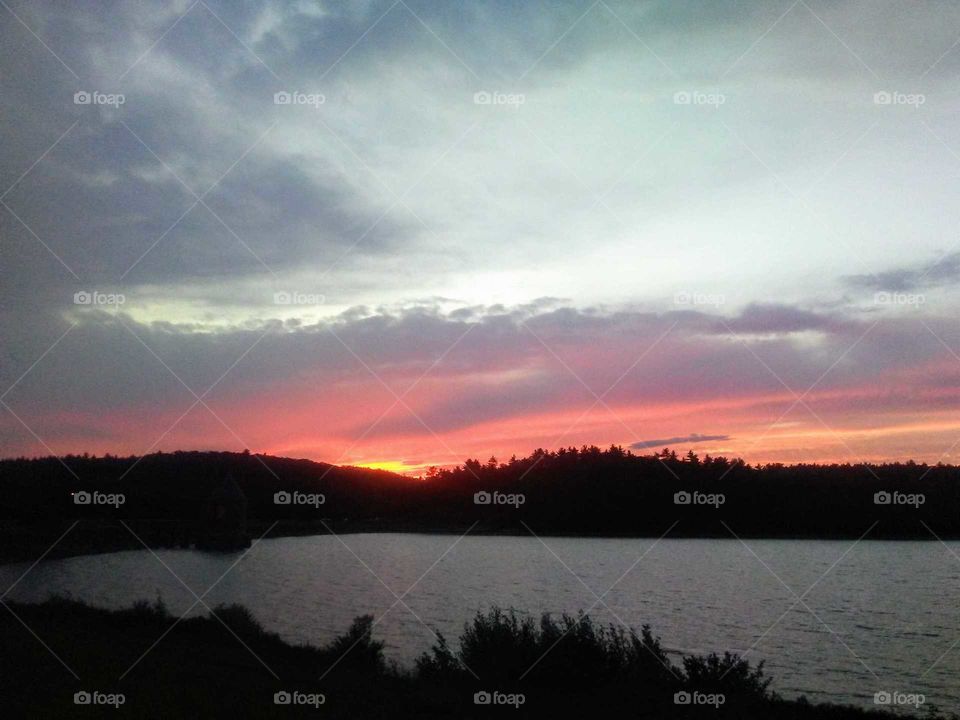 This is a beautiful sunset I was able to get a photo of one night at the lake near my home.