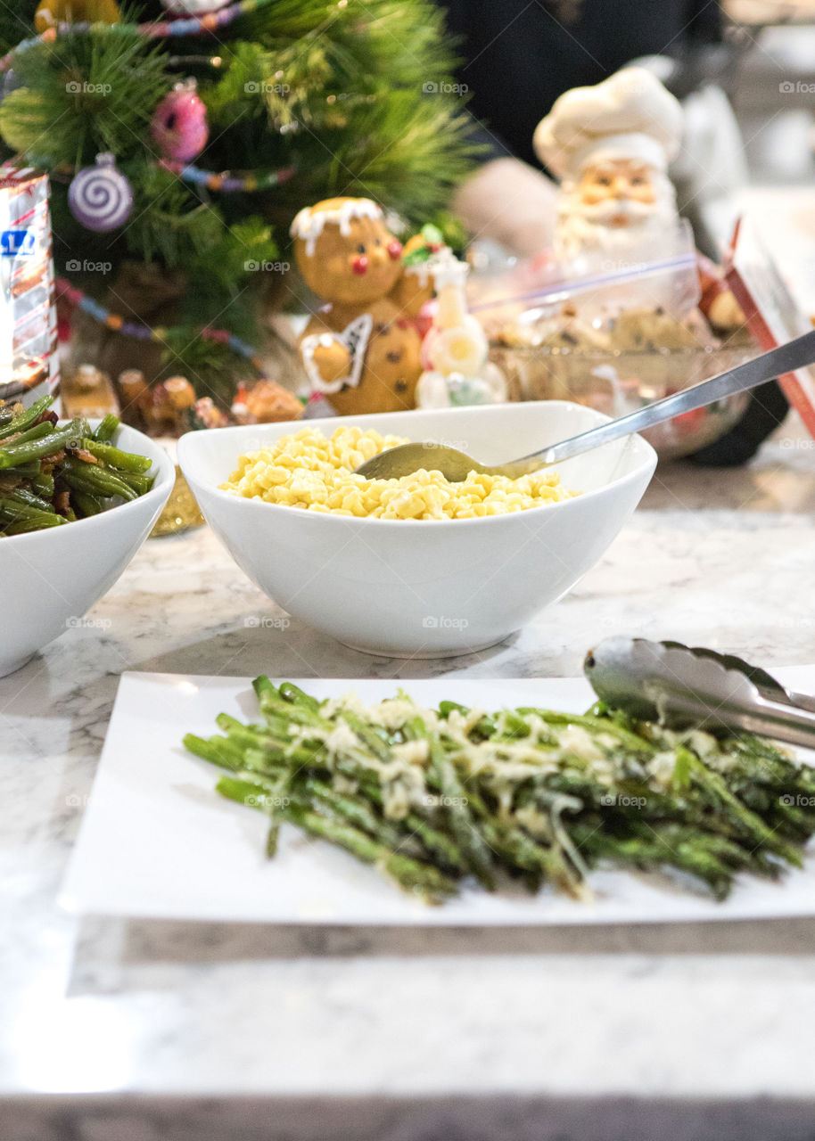 Delicious holiday meal featuring creamed corn and asparagus. 