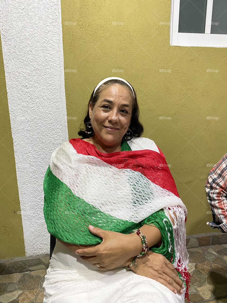 Woman mother portrait smiling while celebrating country’s Independence Day.