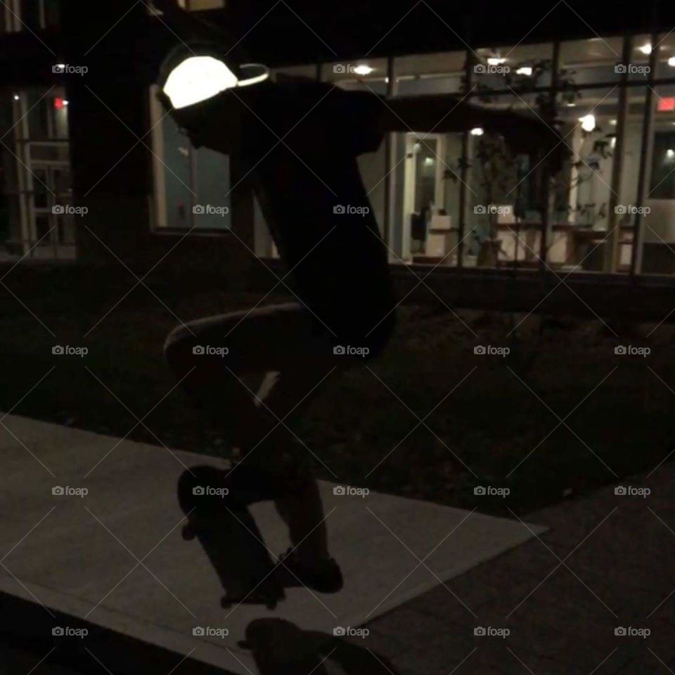 Skateboarding at night with Reflective Hat