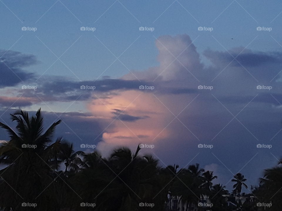 tropical evening the island is immersed in delicate colors of pink and purple shades