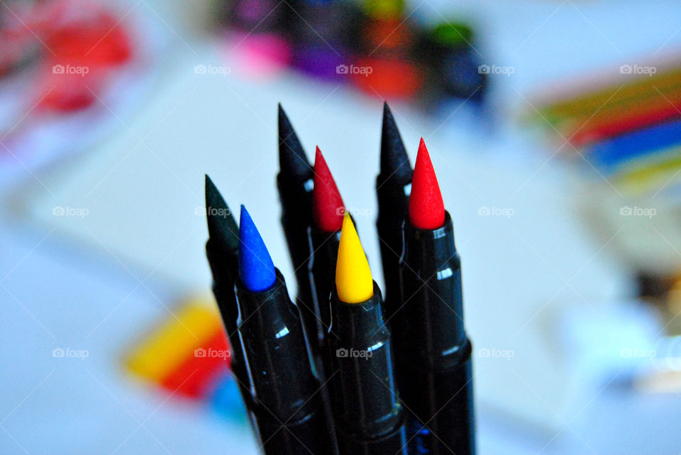 Colored brush pens, colored markers, Art supplies, colored pencils, paintbrushes, paint, sketch book, watercolor pad, palette