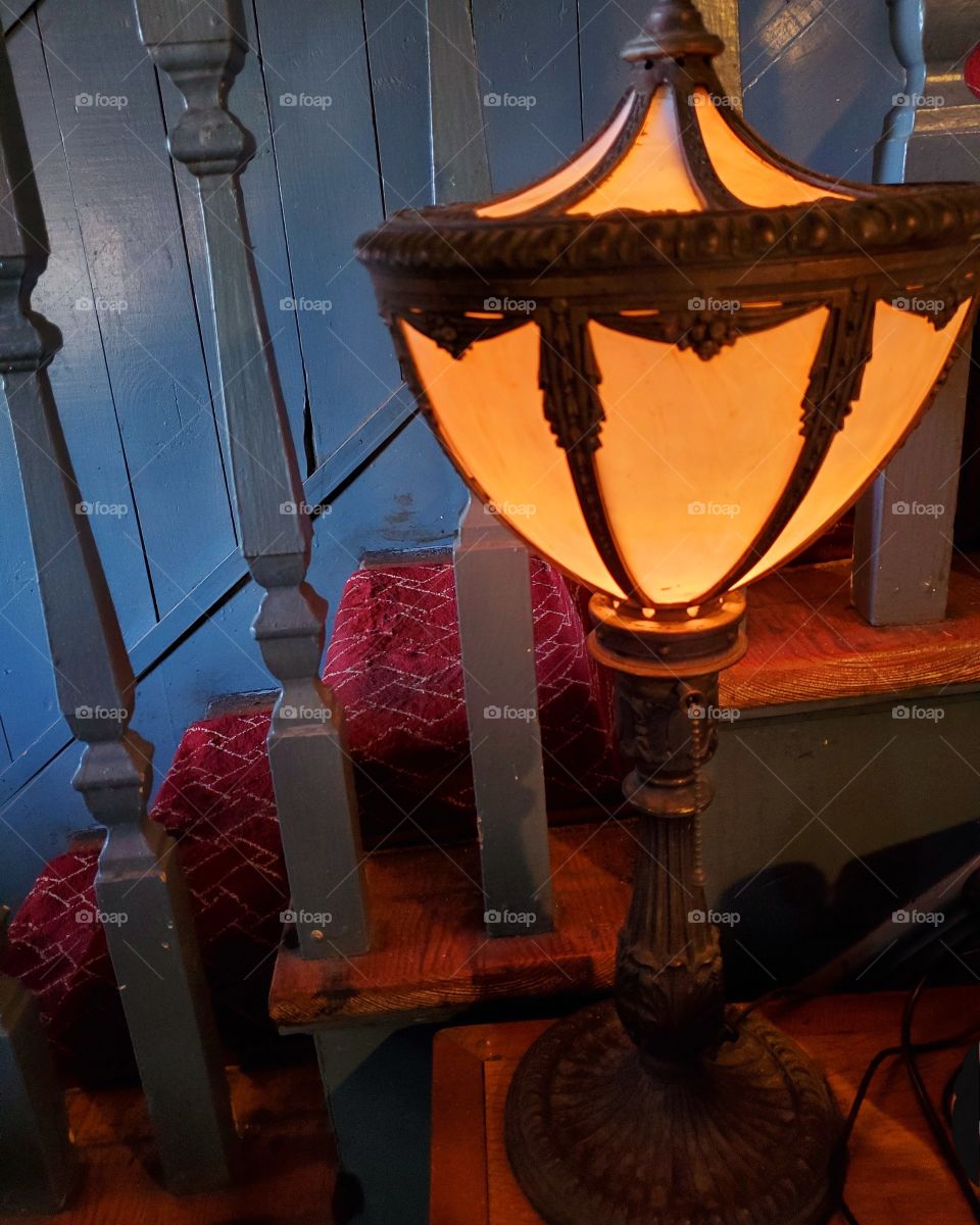 light on the stairs in a 200 year-old log house