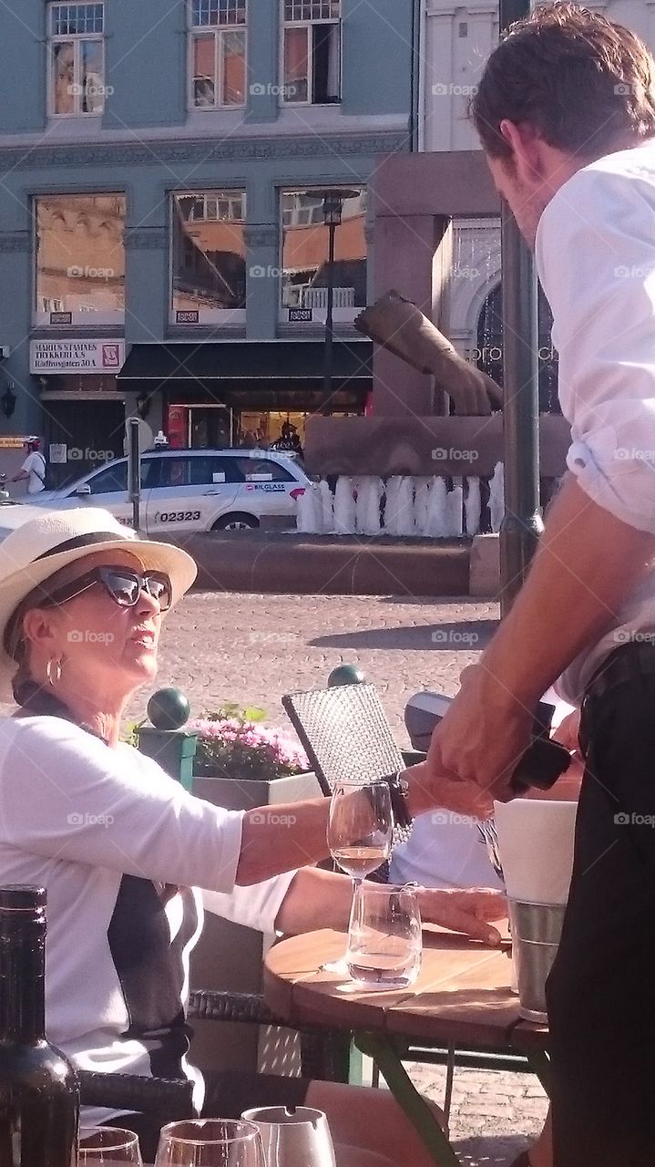 Yes, M'am, a glass of wine