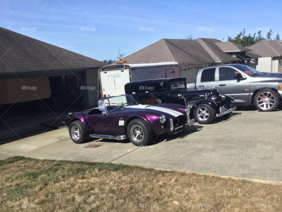 Vintage convertible in a Driveway 