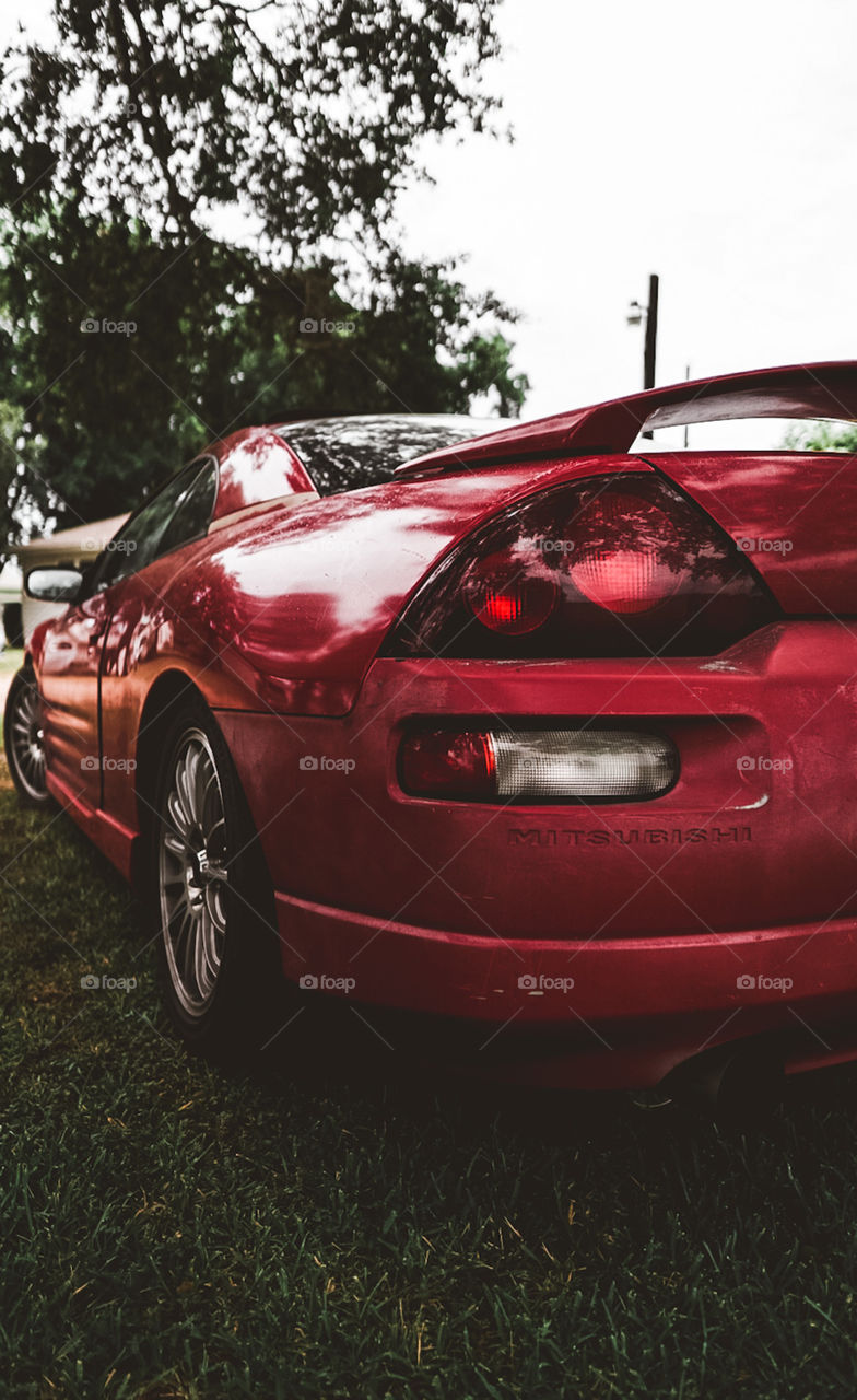 Red lowered Mitsubishi Eclipse GT