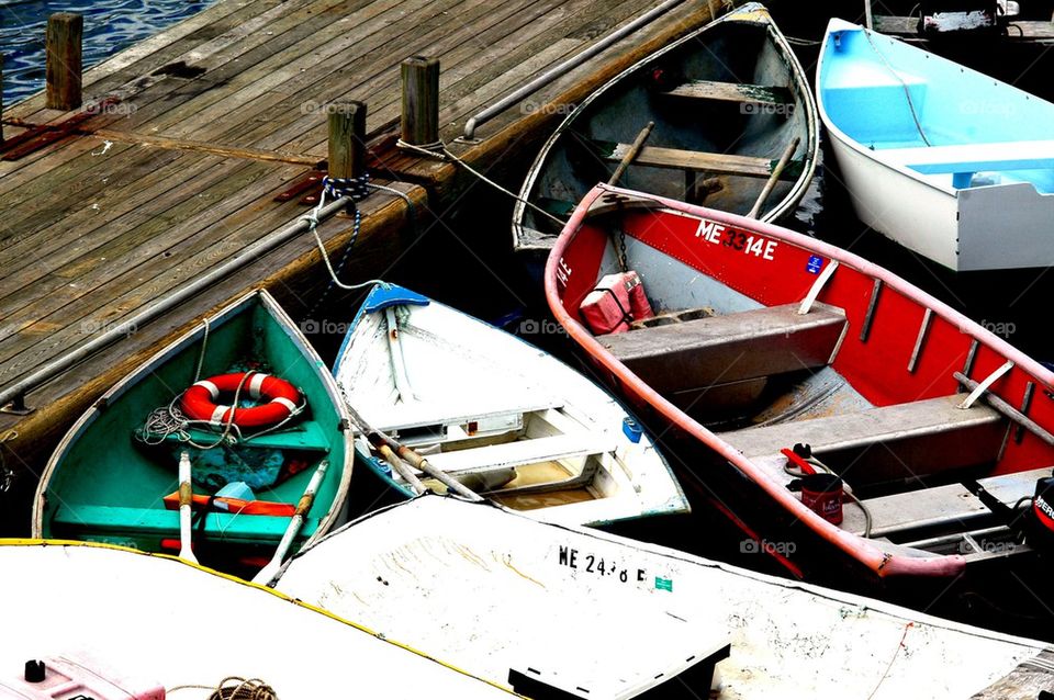 Docking. Boats anchored at a pier in Maine 